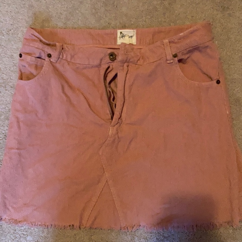 light pastel pink skirt brand is White Crow.